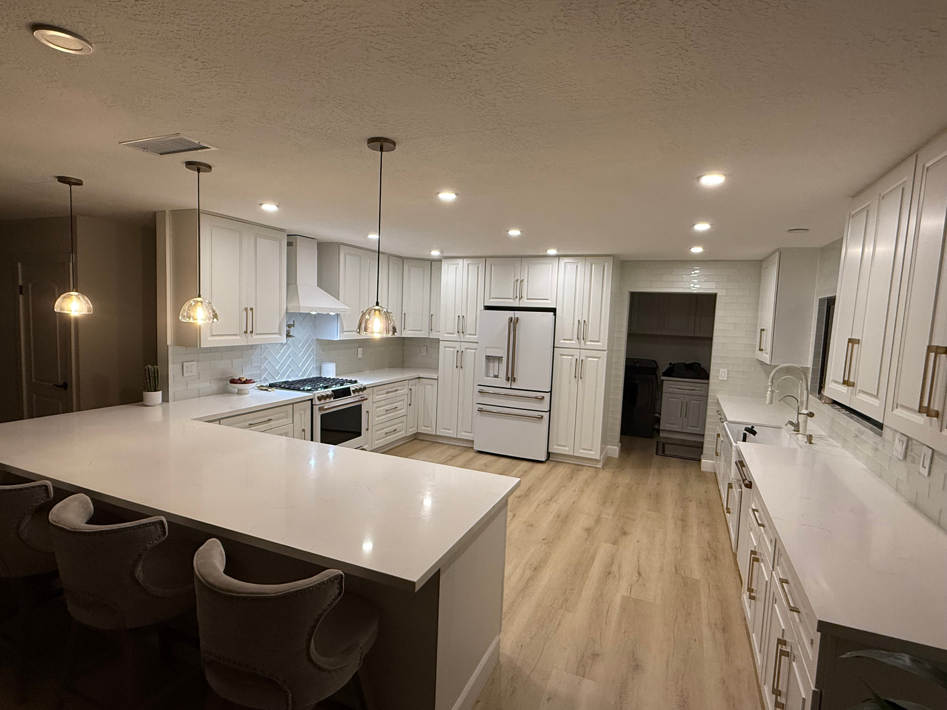 HOA kitchen electrical upgrade with recessed lighting and modern fixtures.